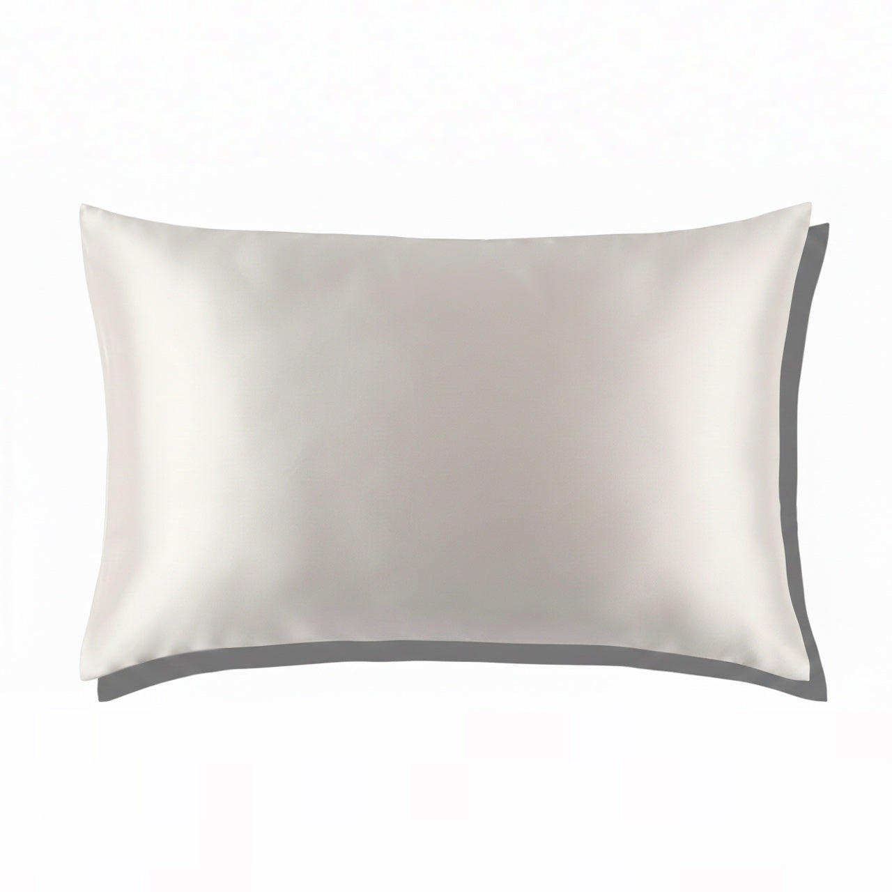 Close-up shot of ohmysilk White 22 momme mulberry silk pillowcase with a secure envelope closure, showing natural silk texture and soft wrinkles.